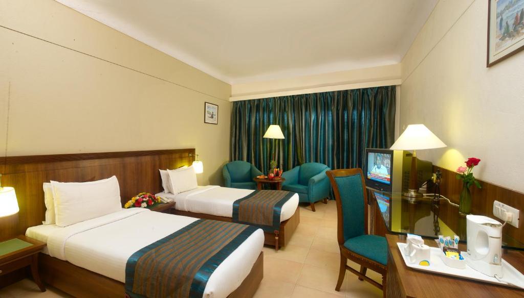 Uday Suites - The Airport Hotel Thiruvananthapuram Kamer foto